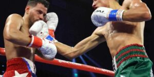 El mexicano Rafael Espinoza da sorpresa y logra título en peso pluma